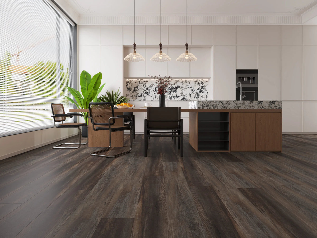 Modern kitchen with wooden flooring, dining table, and kitchen island.