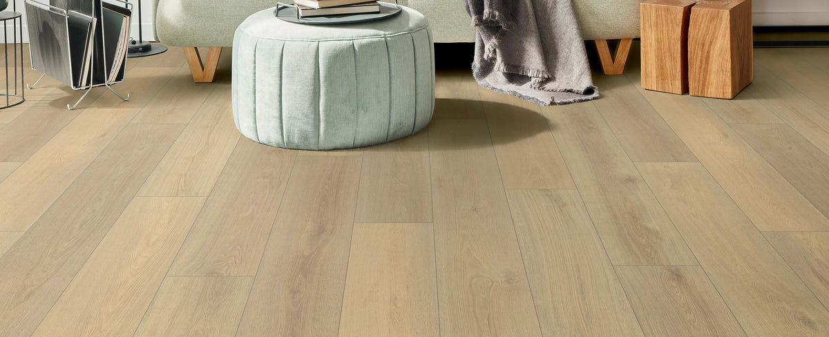Wooden flooring with a light finish in a room setting