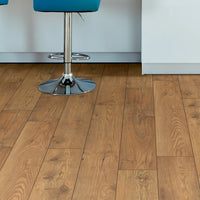 Wooden flooring with chairs and a basket in the background
