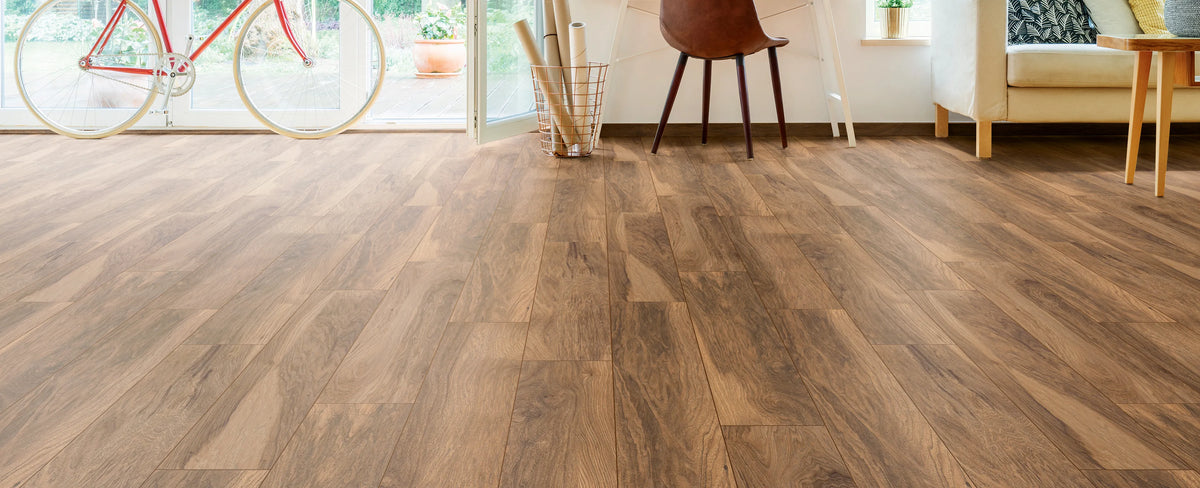 Wooden flooring in a room with furniture and decor