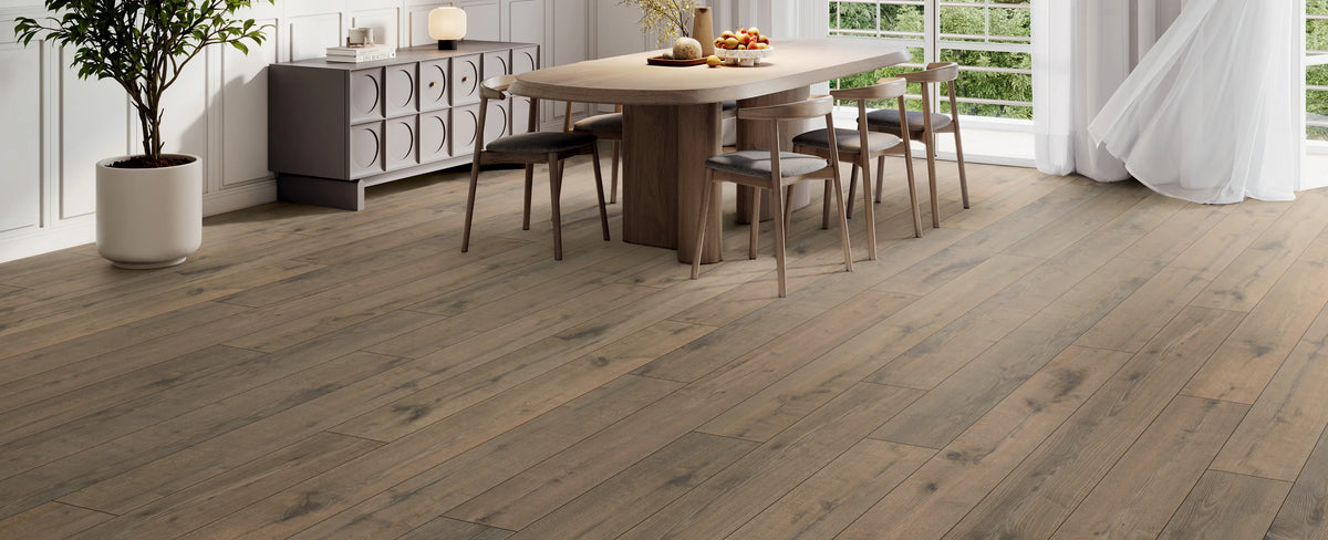 Wooden flooring with a dining area in the background