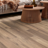 Wooden flooring with a living room setting in the background