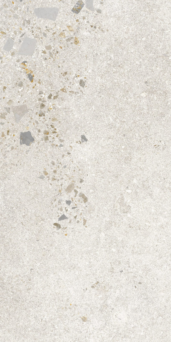 Textured concrete surface with small stones and pebbles