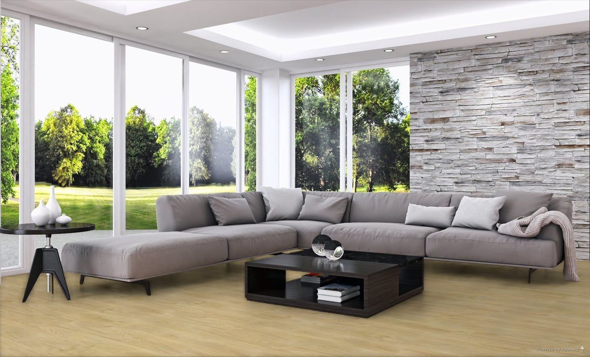 Modern living room with a large sectional sofa, coffee table, and decorative items.